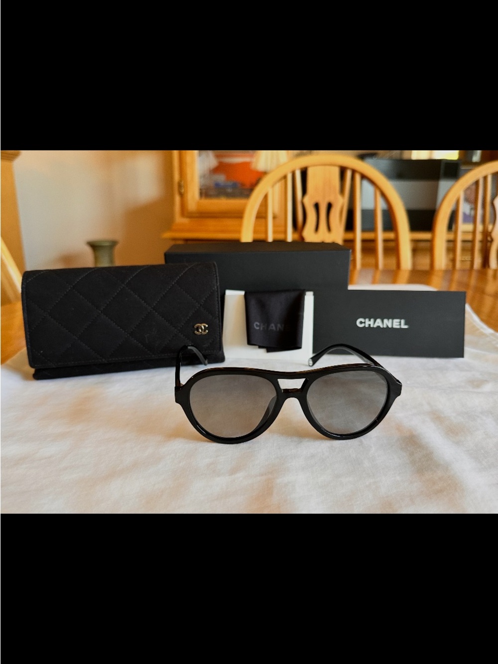 CHANEL Black Round Sunglasses with Gradient Lenses